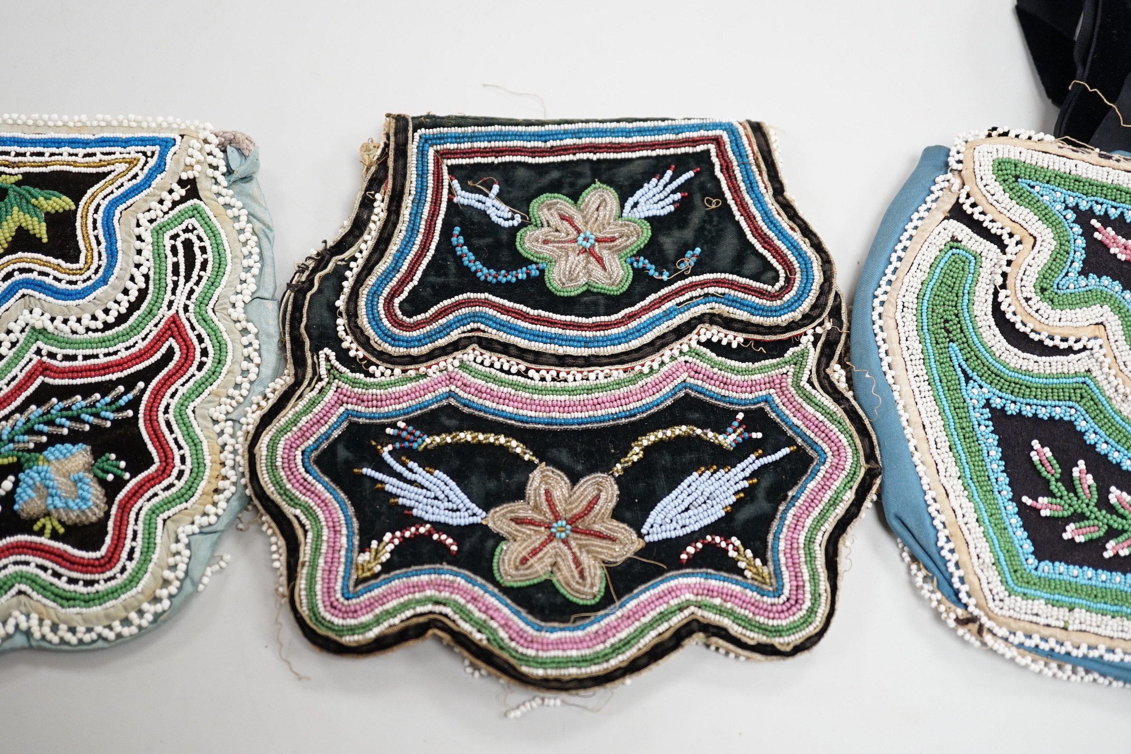 Three mid to late 19th century, Haudenosaunee (Iroquois) Grand River Reserve, native North American/Canadian fine glass beadwork and silk bags